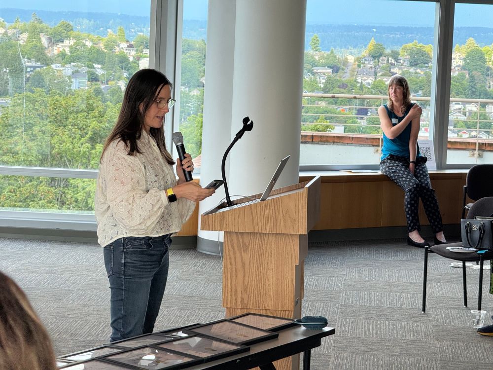 Michele Thomas, Director of Policy and Advocacy, addresses advocates during the celebration in Seattle.
