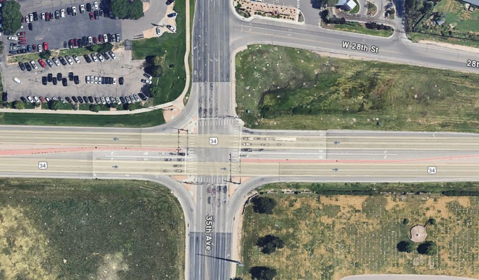 Google Maps satellite image of US Highway 34 and 35th Ave in Greeley Colorado. It shows an at grade intersection 