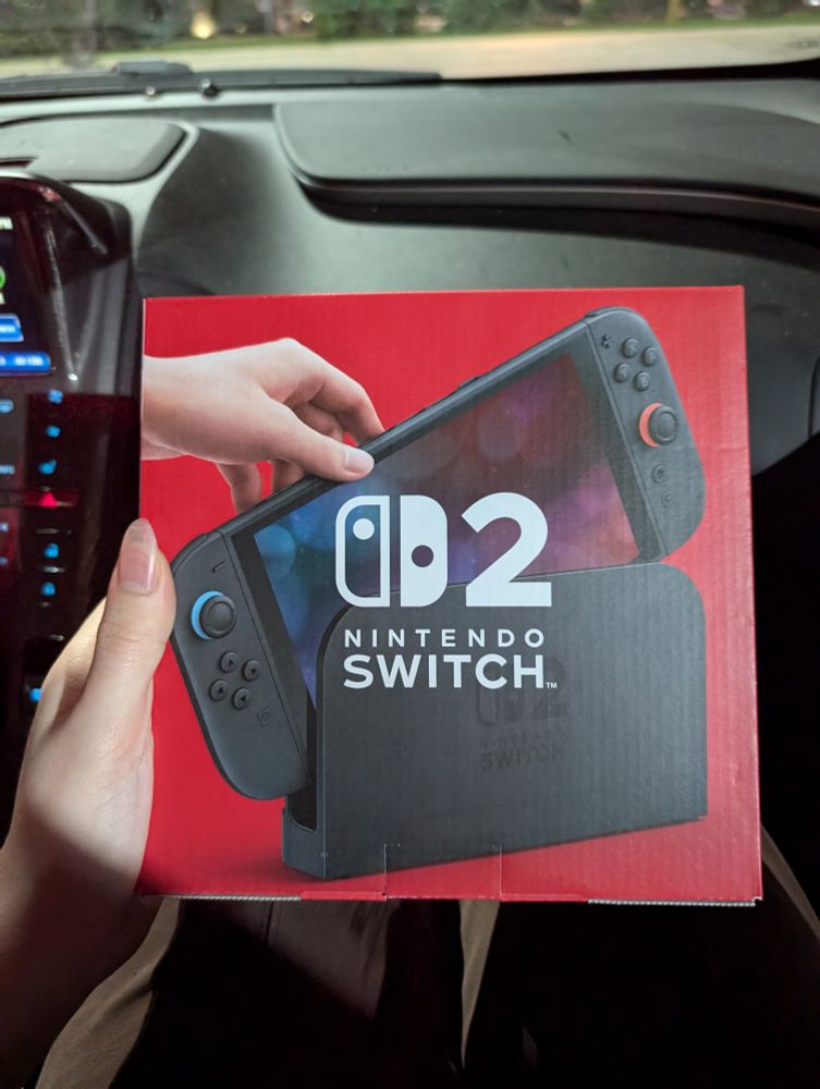 Me holding a switch 2 at long last :]