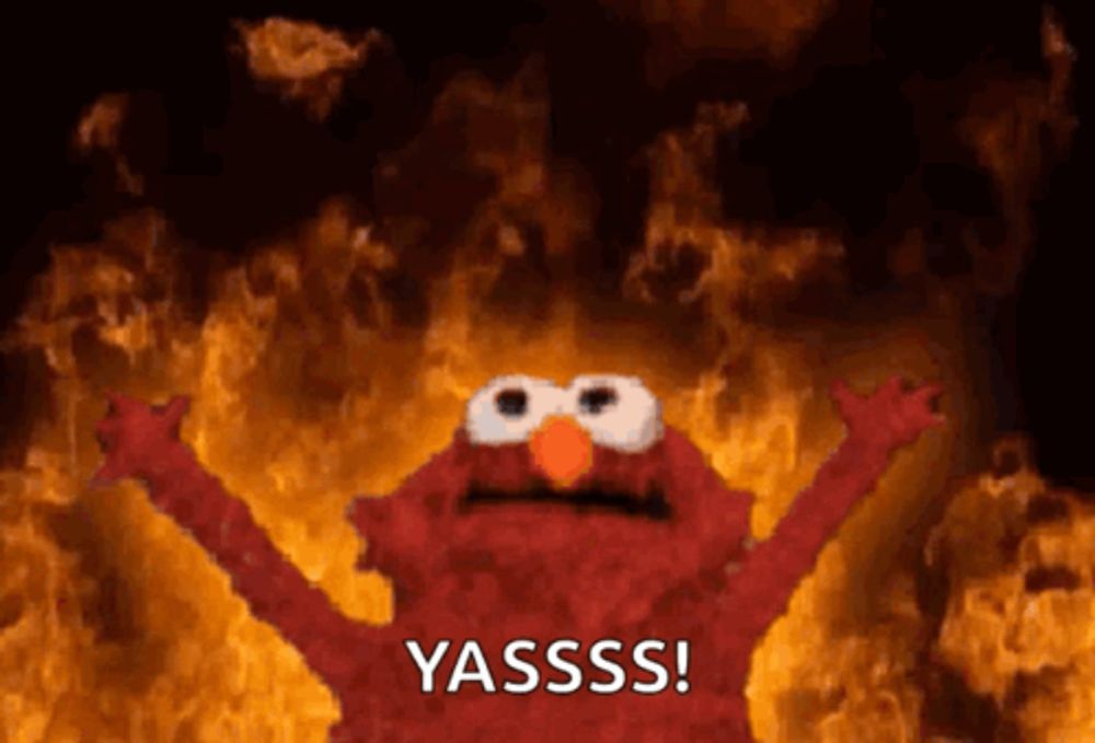 elmo from sesame street is surrounded by flames and says yasssss