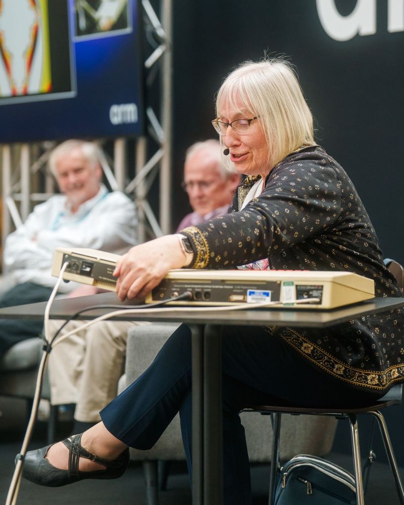 Sophie Wilson onstage using a BBC Micro with ARM coprocessor