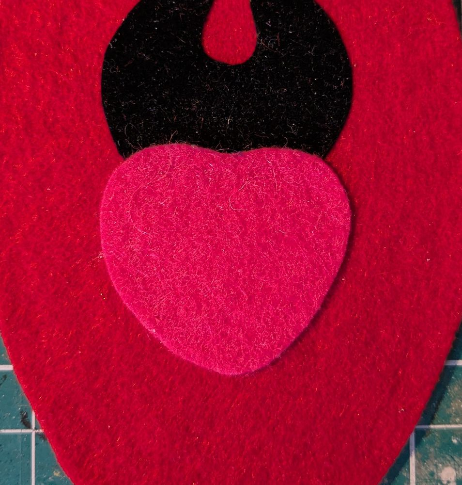 A close-up of my WIP replica Kermit's mouth plate. His pink felt tongue looks like a little heart. 