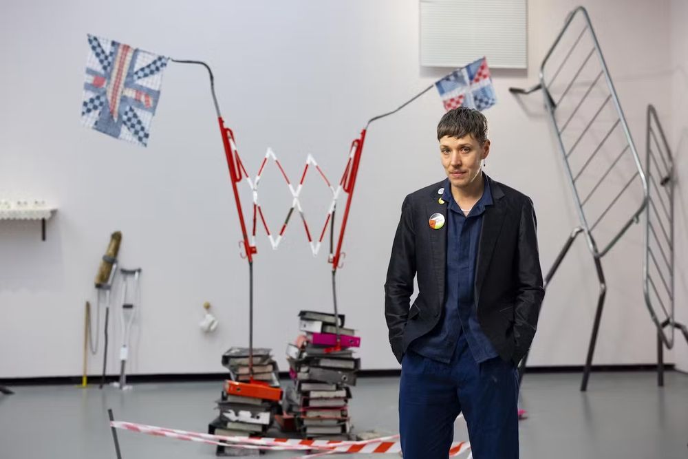 Turner Prize winner Jesse Darling in front of his politically critical installation in Eastbourne, south-east England