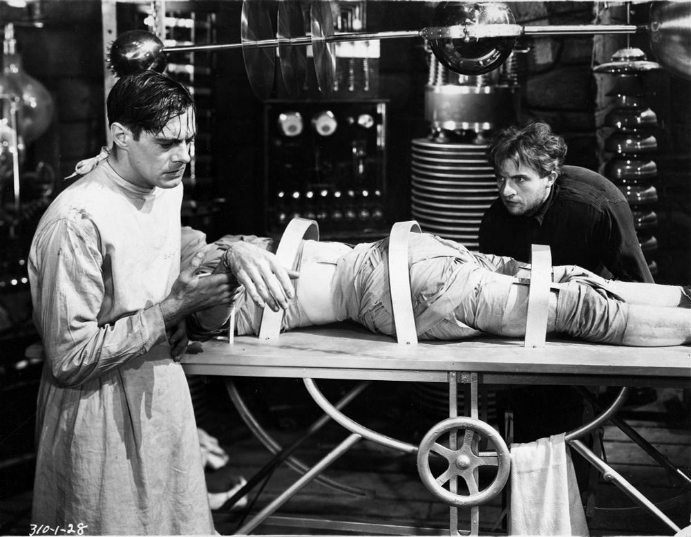 Screenshot from the 1931 Frankenstein movie with Frankenstein, Frankenstein, and the guy everyone thinks is Igor