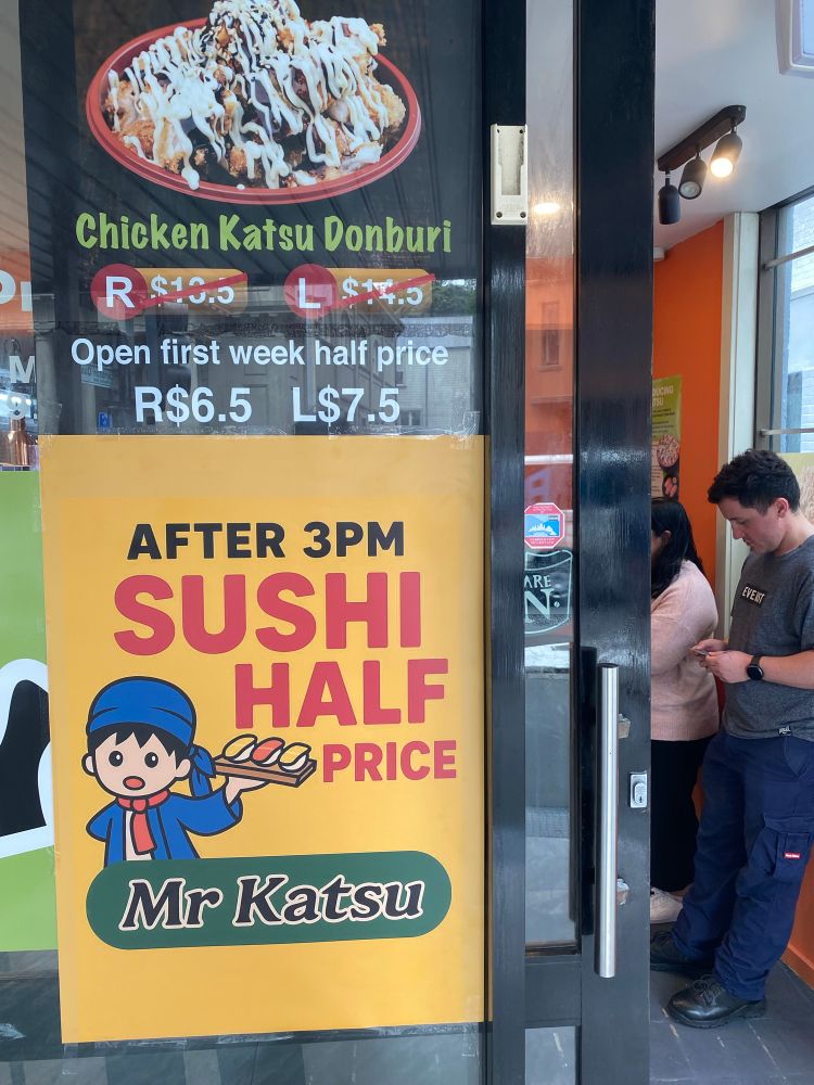Sign for half-price sushi after 2pm