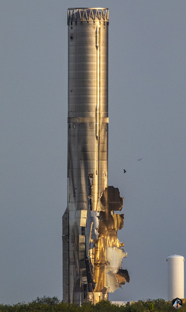 Starship Booster 18 with its lower tanks ripped open.