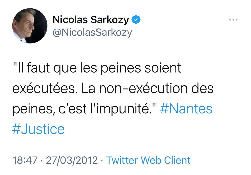 A screenshot of a 2012 French-language tweet by former French President Nicolas Sarkozy, displayed on Twitter (now X). The profile image shows Sarkozy in a black-and-white side-profile portrait, wearing a suit and tie, with a serious expression. The tweet text reads: "Il faut que les peines soient exécutées. La non-exécution des peines, c'est l'impunité." (Translation: "Sentences must be carried out. The non-execution of sentences is impunity.") It includes hashtags #Nantes and #Justice, posted on March 27, 2012, via Twitter Web Client. The composition features the tweet in a light gray interface with blue accents on usernames and timestamps.
