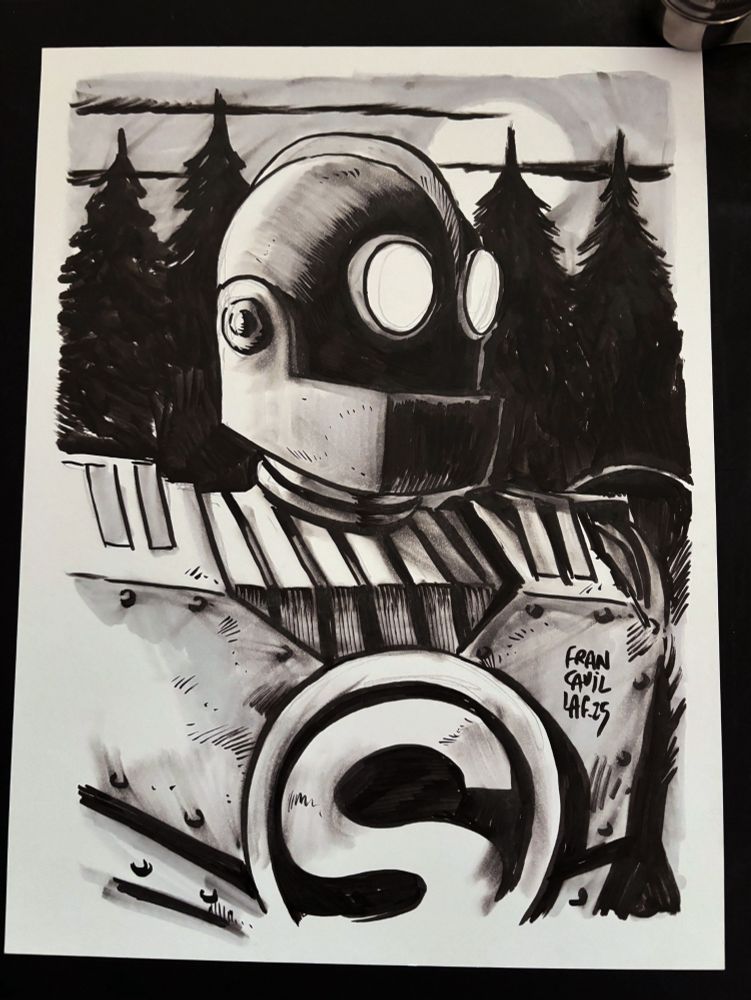 A drawing in ink of the iron giant in the woods