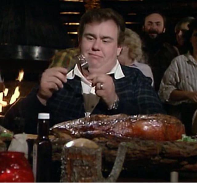 Chet Rippey prepares to eat an old 96er in The Great Outdoors