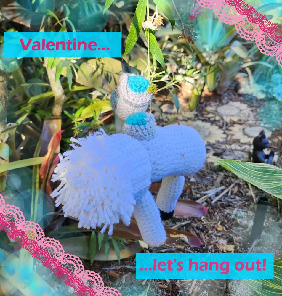 Plushie Shiro dangles precariously above the ground, hanging from a flower stem just barely held up by the clear nylon thread attaching his plushified floating forearm to his plush prosthetic shoulder. Pink and dark pink lace "wraps" around the edges to decorate the image along with soft blue light glimmers. Text reads "Valentine... ...let's hang out!"