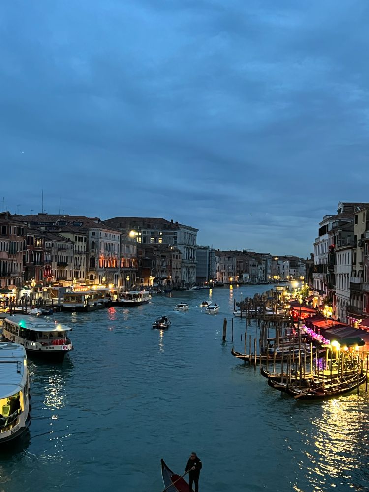 Venice grand canal picture of boats in the water around sunset