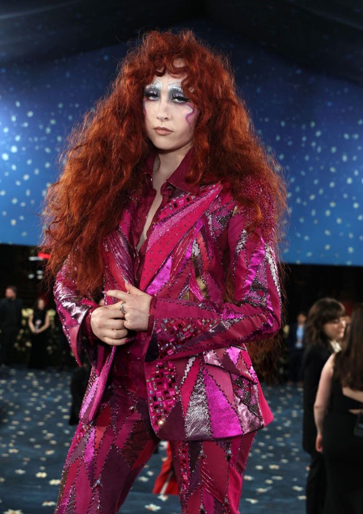 chappell roan in a custom pink paul tazewell suit for met gala 2025