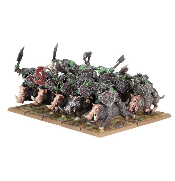 A bunch of Warhammer orcs on boars, which are modelled to be in motion, cantering along