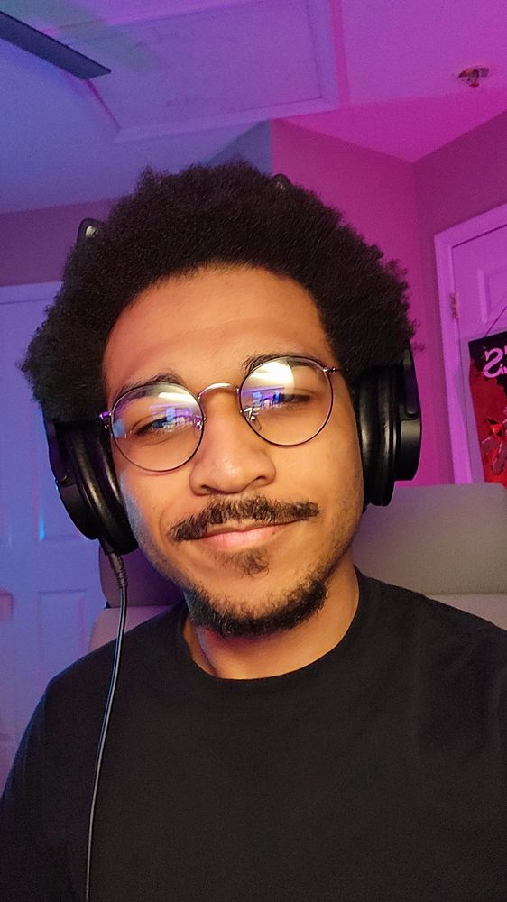 Selfie of me in blue and pink lighting