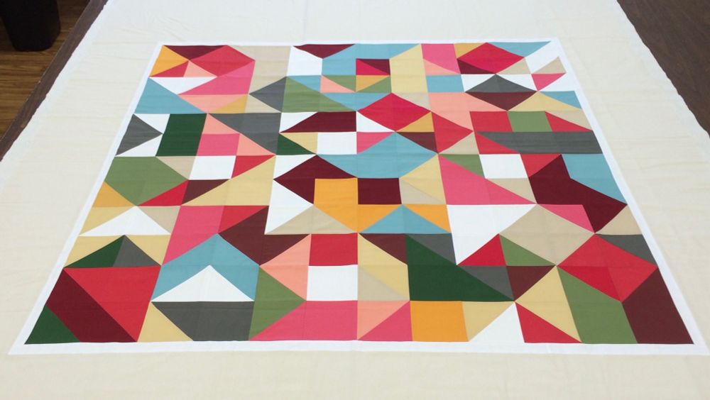 Trangle shapes in quilt with Key West color palette 