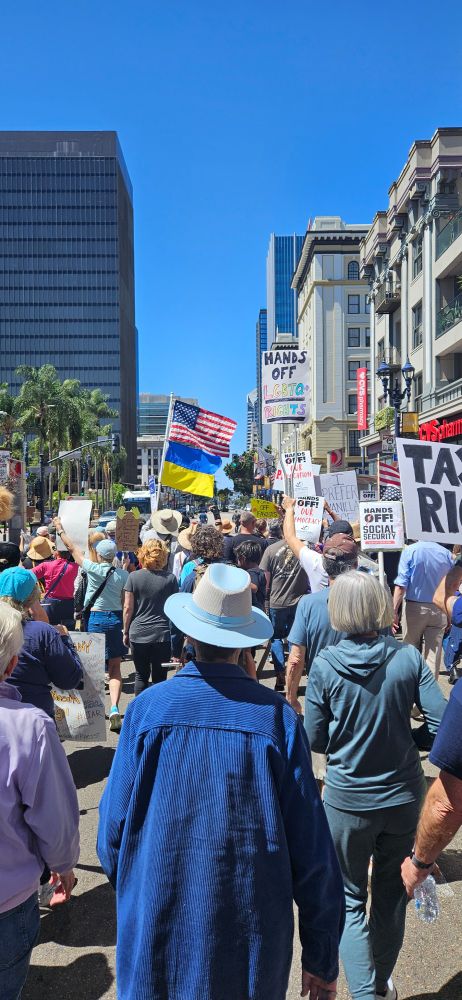 A group of people marching in a protest