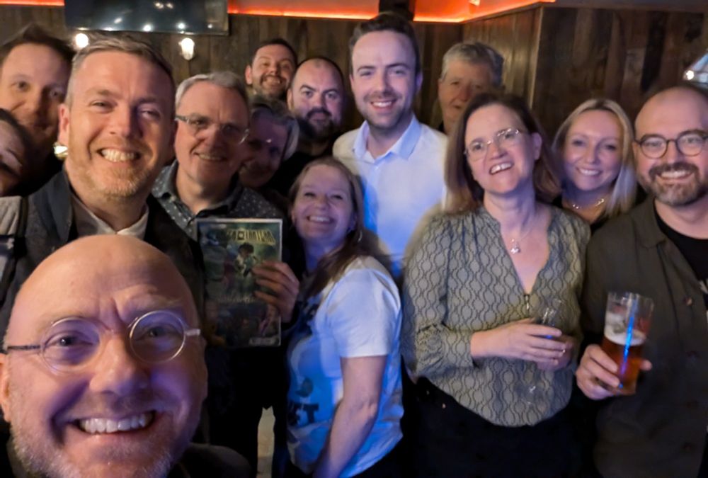 A selfie-style picture showing Patrick Harvie in the foreground, with Mal O'Hara and a group of Green Party of Northern Ireland members