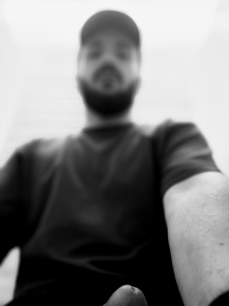 Bearded guy shows off his hard, fat cock tip for #monochromemonday.
