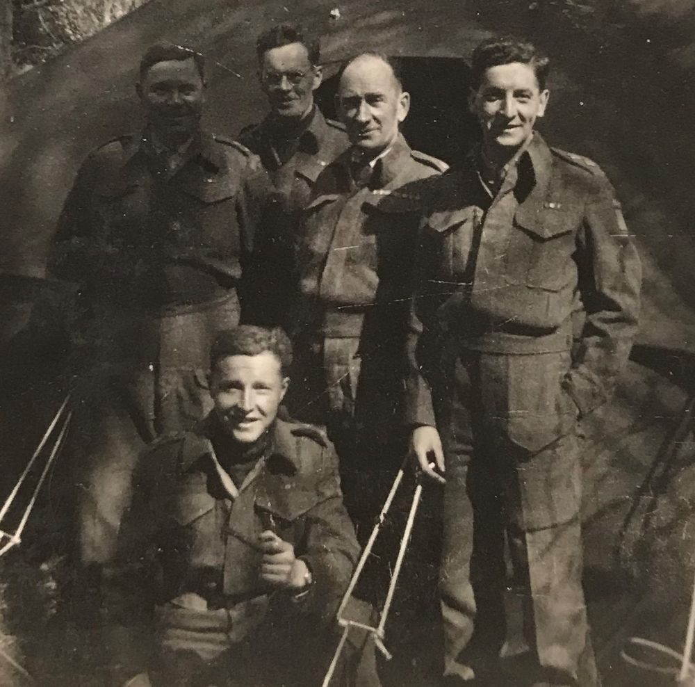 Archie MacNaughton
Archie MacNaughton, standing second from the right. Photo taken on 4 June 1944, two days before D-Day.
(courtesy of the family of Major J. Archie MacNaughton)
From the Canadian Encyclopedia https://www.thecanadianencyclopedia.ca/en/article/archie-macnaughton