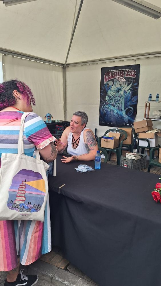 Chatting with a reader after signing 