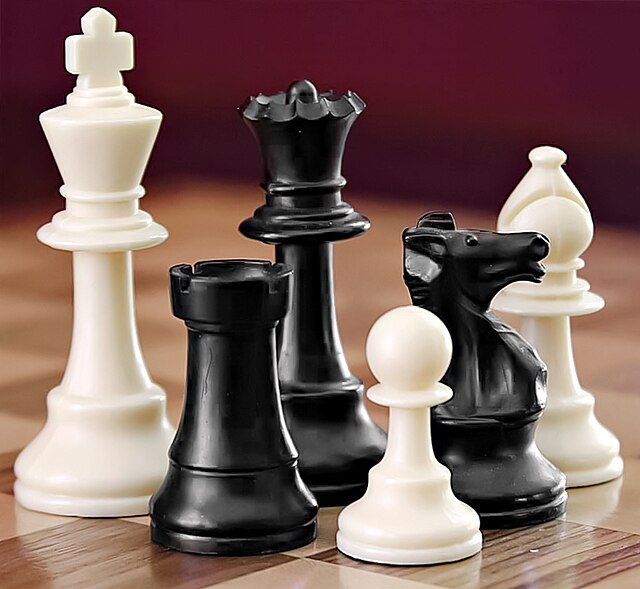 a selection of chess pieces