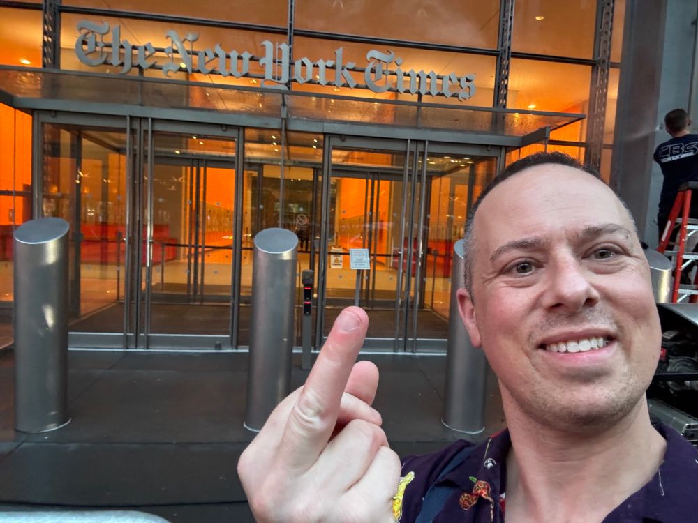 Picture of me in front of New York Times building giving it the finger.