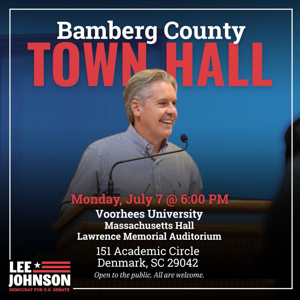Man at podium promoting Bamberg County Town Hall, July 7 at 6 PM at Voorhees University, Denmark, South Carolina.