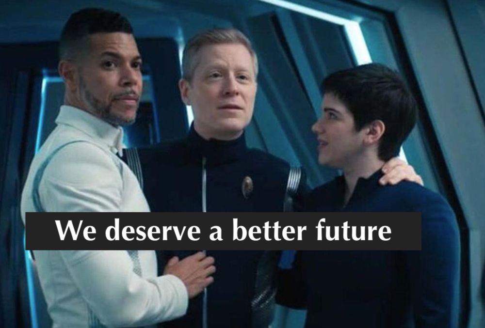 A photo of Dr. Culber, Stammets, and Adira from Star Trek Discovery in an embrace. Caption in front reads "We deserve a better future".