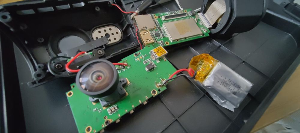 A disassembled dashcam.