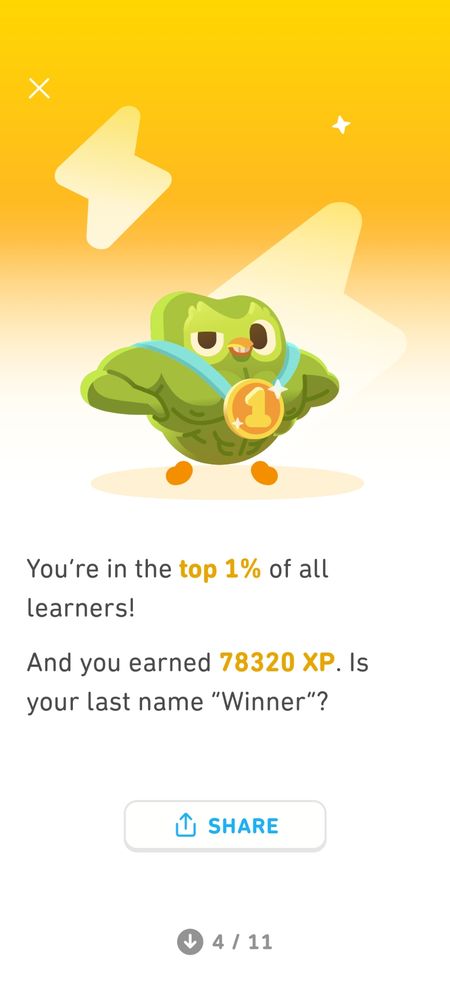 A Duolingo owl wearing a medal to celebrate being in the top 1% of all learners) 