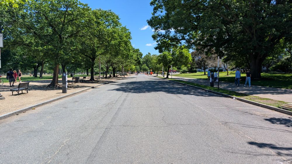 Street on the National Mall with no cars or traffic. 