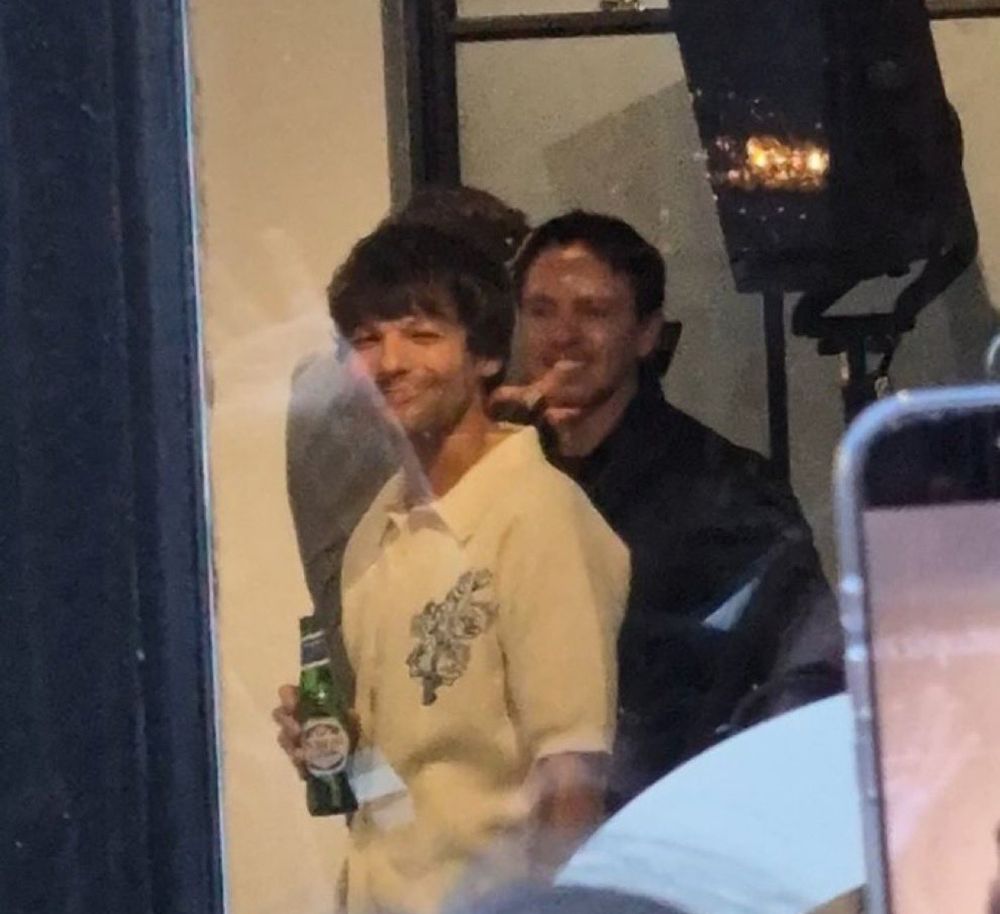 Louis wearing the 28 button mesh knit