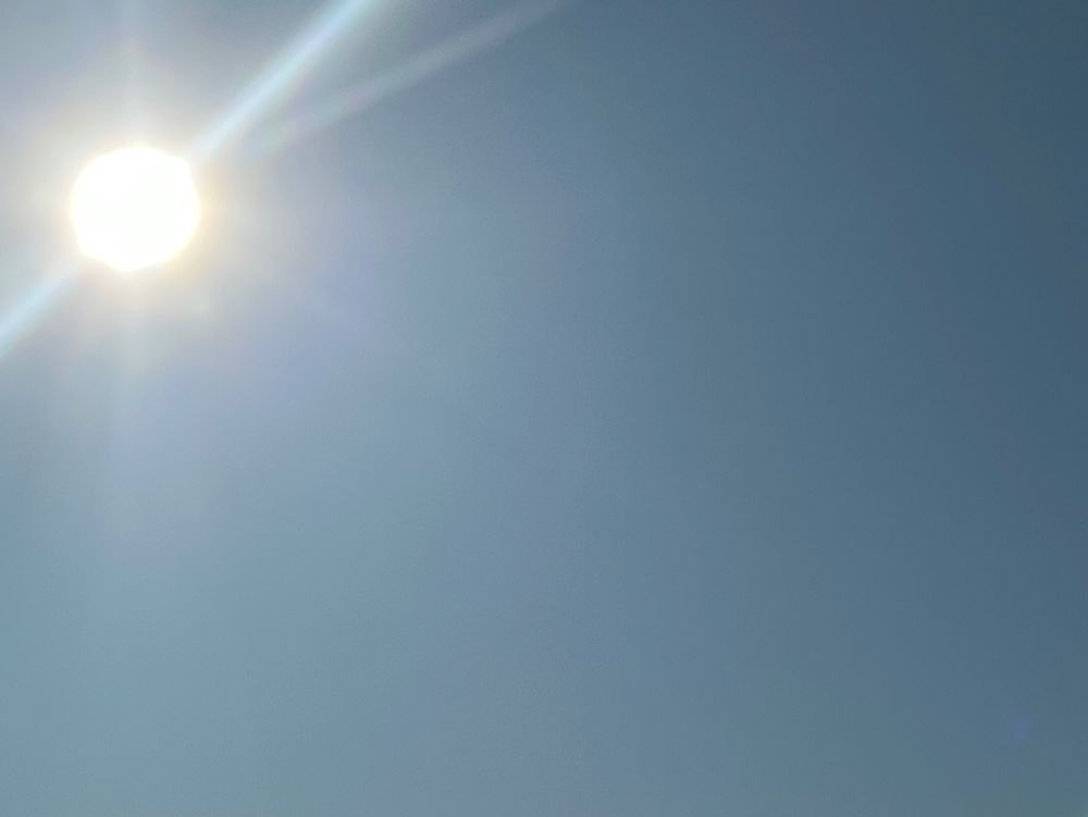 A perfect blue sky and a perfect summer sun.