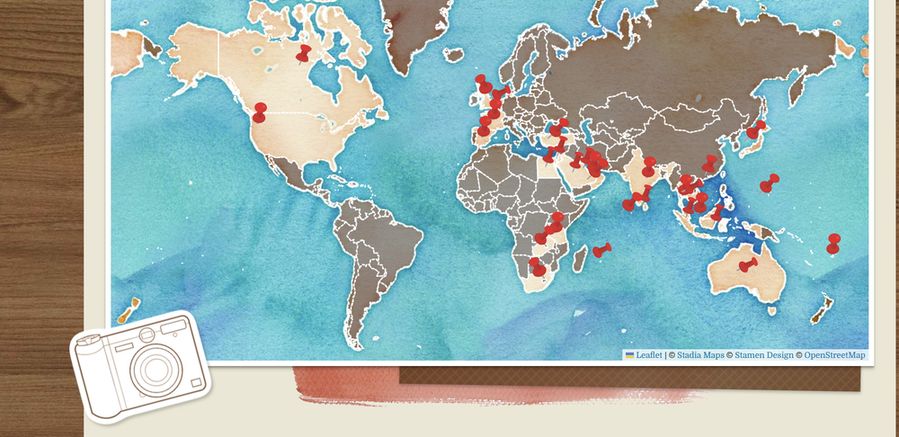 Leaflet map with watercolour tiles; red pins mark the countries I've visited - around 30
