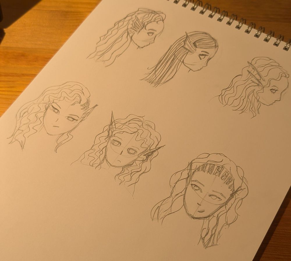 six noobily drawn mermaid heads with webbed ears