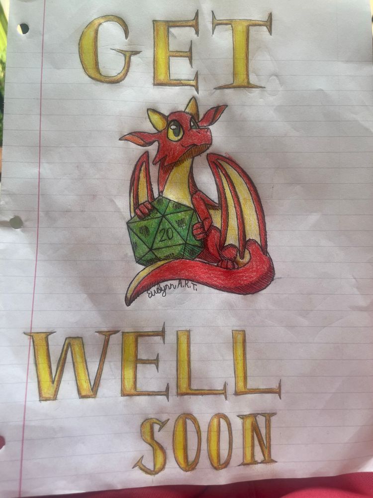 A get well soon card with a dragon and d20 from my eldest child