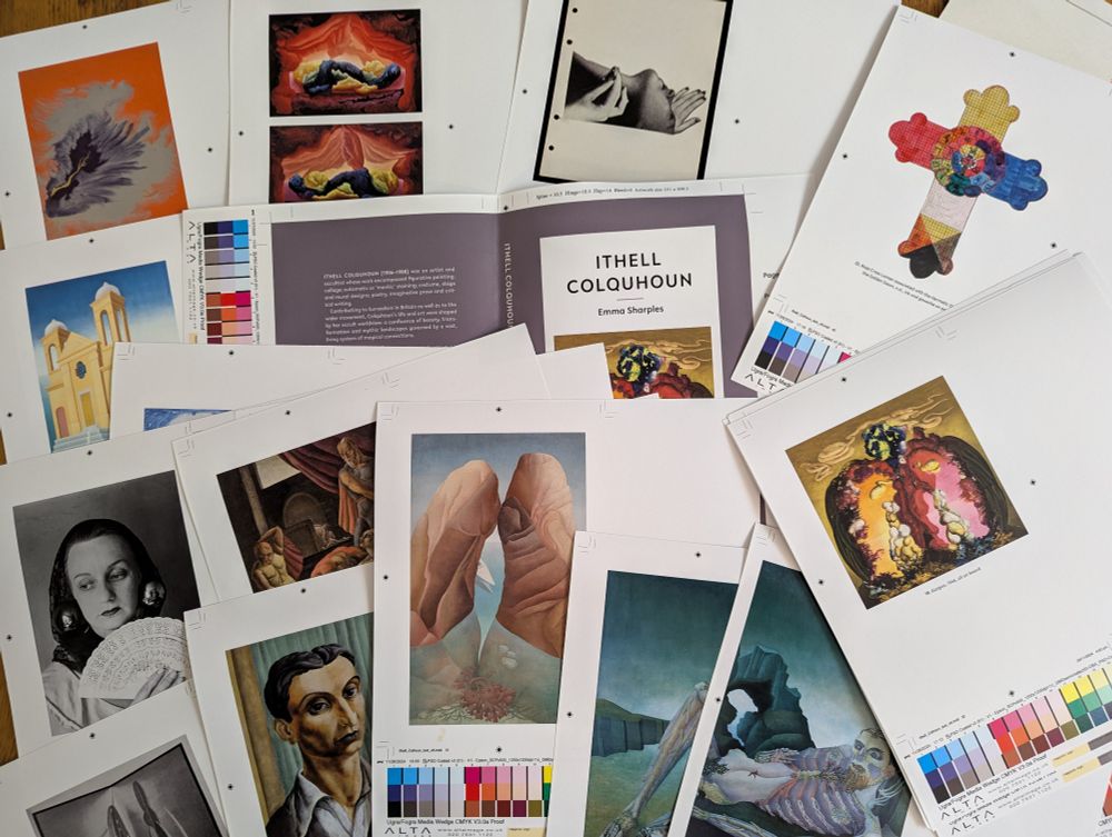 Colour proofs from the forthcoming Ithell Colquhoun book showing the book jacket, images of the artists work and colour bars on the sheets of paper spread out on a table 