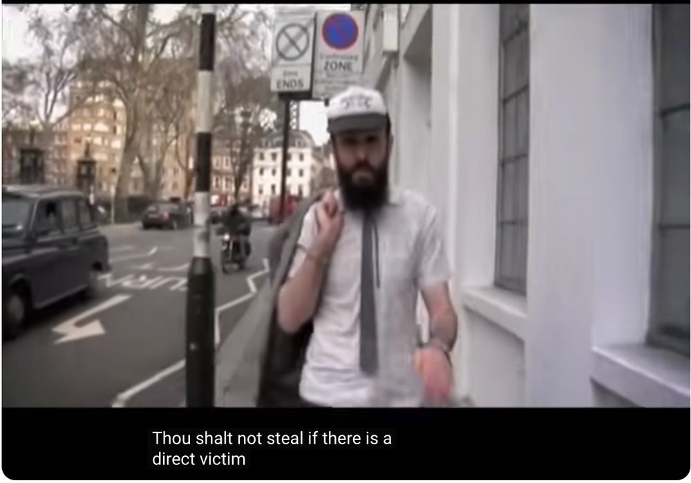 a skinny white rapper says "Though shalt not steal if there is a direct victim"