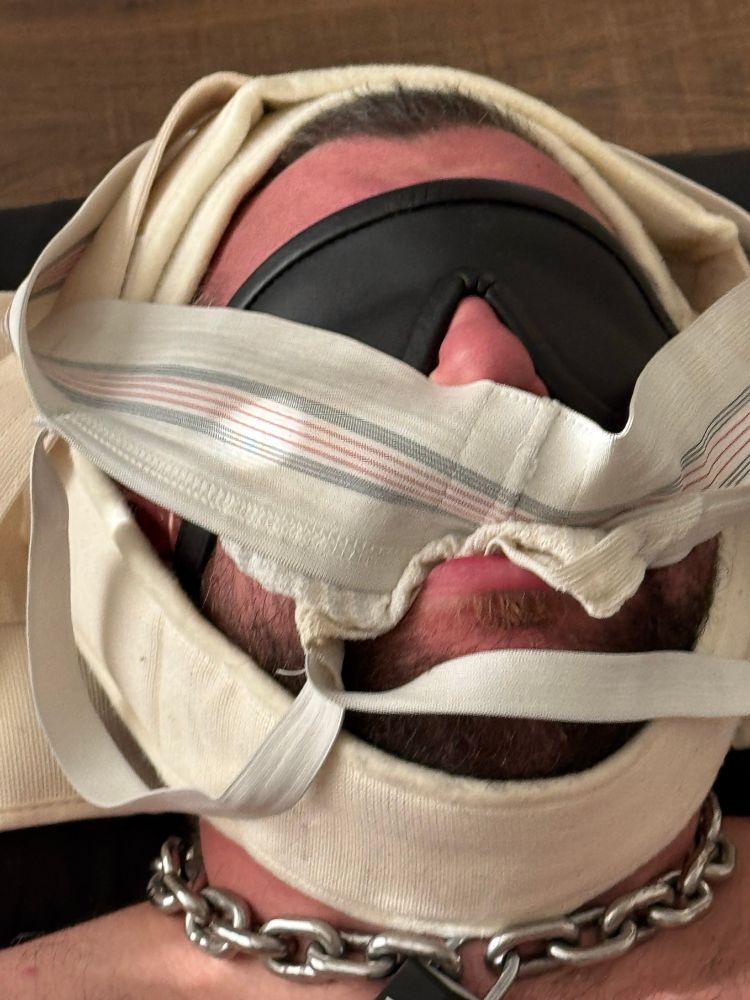 Switchybear94 is gagged with Daddy’s piss and cum stained jockstrap. 