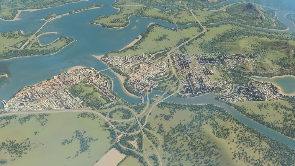This specific image is a birds eye view of the city at day looking from the top right side to the bottom left side, kinda where the river comes from