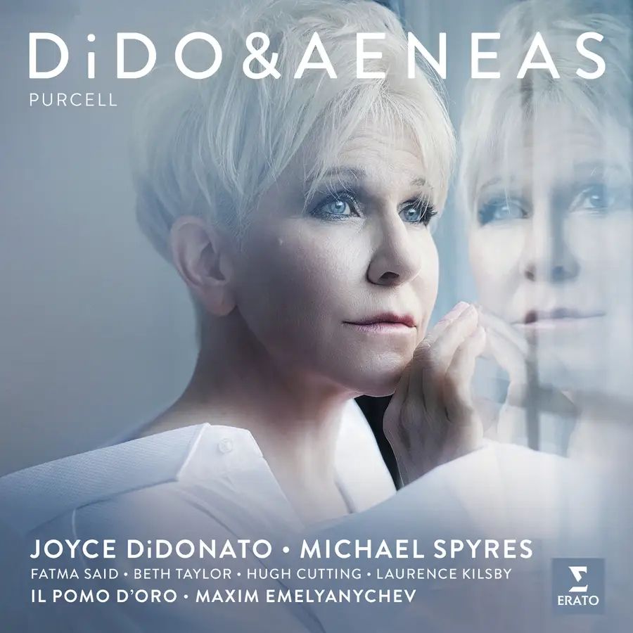 Record cover. Photo of Joyce DiDonato, whose face is reflected on a galss surface.