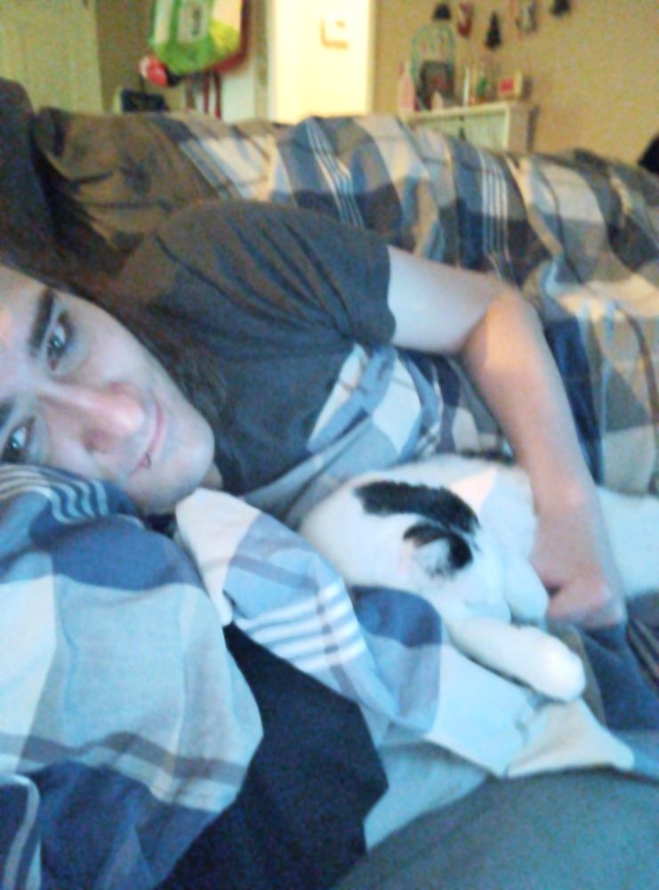 it me candace.  i just woke up on the couch and i'm getting snuggled by my kitty Beatrix.  she's being little spoon.