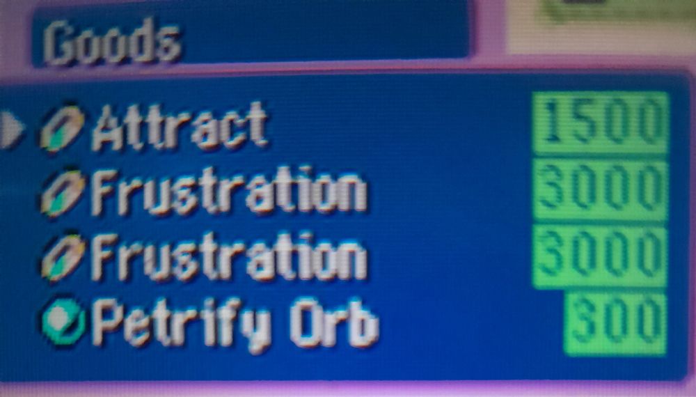 Image of a Kecleon Wares Shop in Pokemon Mystery Dungeon Blue Rescue Team where the shop offers an Attrac and 2 Frustration TMs, as well as a Petrify Orb.