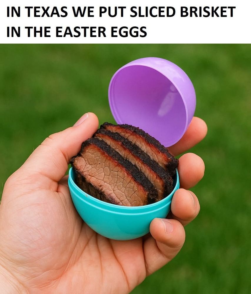 A plastic easter egg with small slices of smoked brisket inside