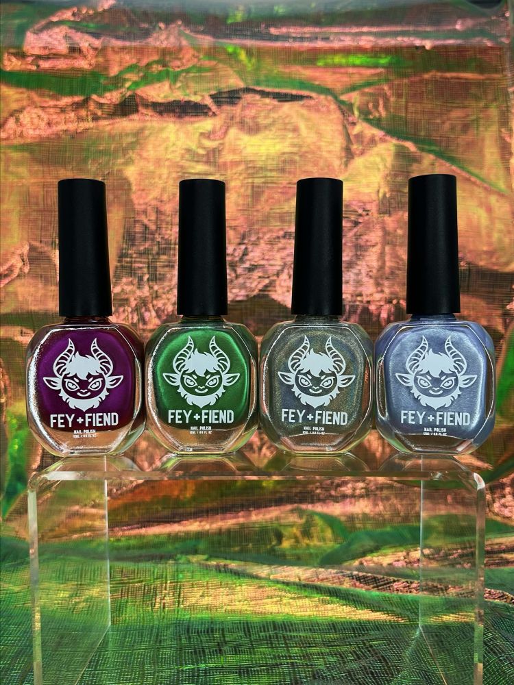 Gay Ass Summer set: left to right, Diva Up (magenta), Feelin Feral (forest green), Gay Sh*t (holographic top coat), and Good Boy (lavender)