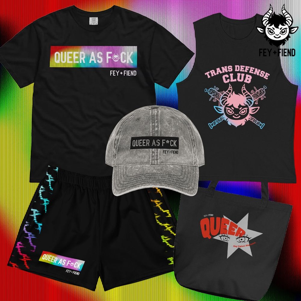 F+F Pride collection shot featuring black queer as fuck shirt, trans defense muscle tee, queer as fuck grey hat, rainbow side panel black athletic shorts and black queer tote bag