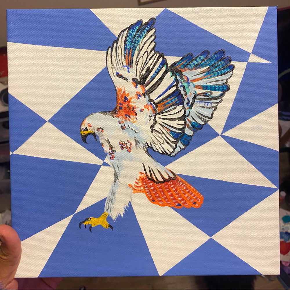 square canvas painting with a white and powder blue geometric background. a mostly white hawk with orange and blue feathers smattered throughout, is in flight/catching prey mid canvas. 