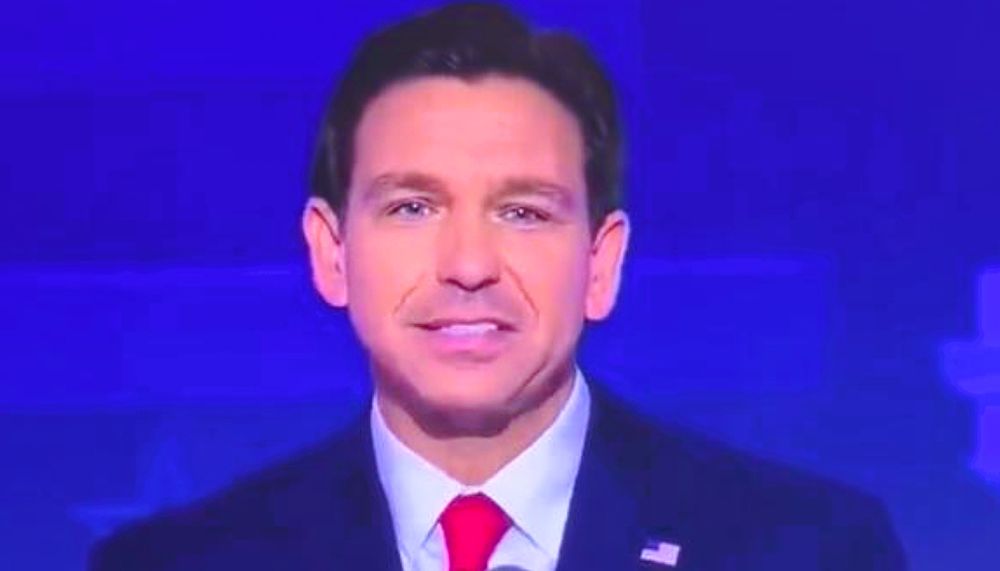 Unfortunately, this is DeSantis beaming about no longer being the poster child for best forced smile.