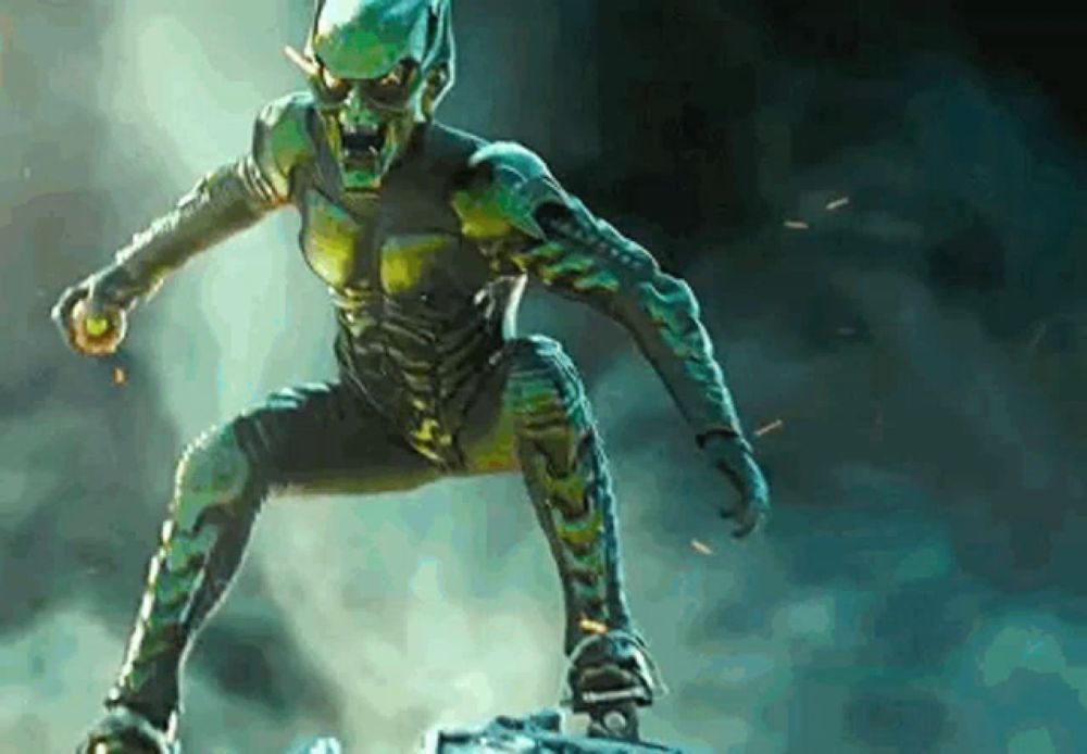 a green goblin is flying through the air on a skateboard .