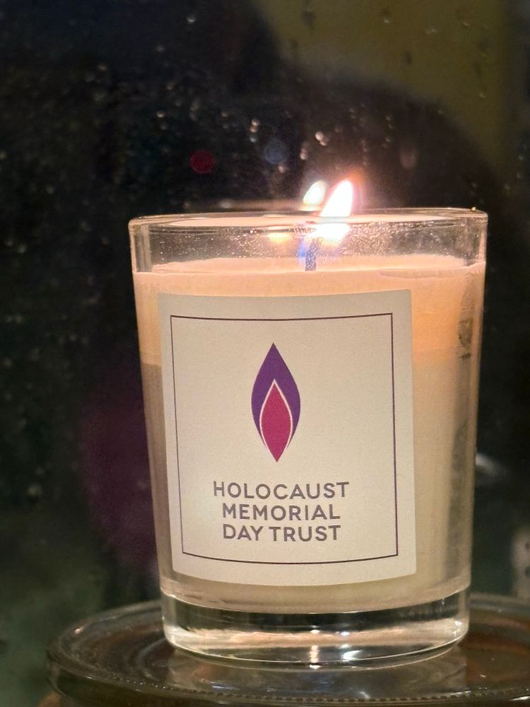 Holocaust Memorial Day candle burning in the window